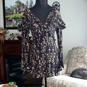 Likely Black Romper with Pink Floral Pattern